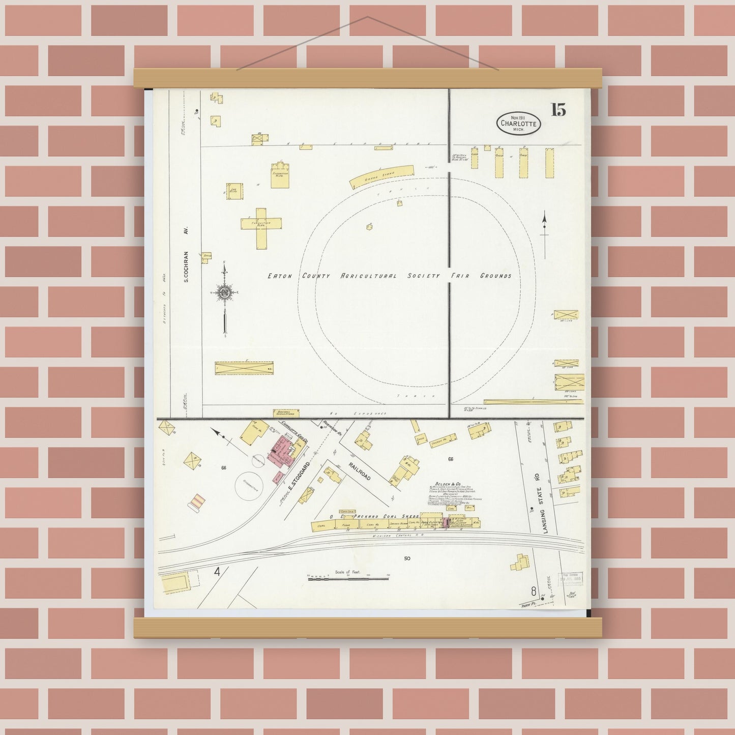 Old map wall art mockup — magnetic wood frame on brick wall — Sanborn Fire Insurance Map from Charlotte, Eaton County, Michigan (1911), Sheet #0015