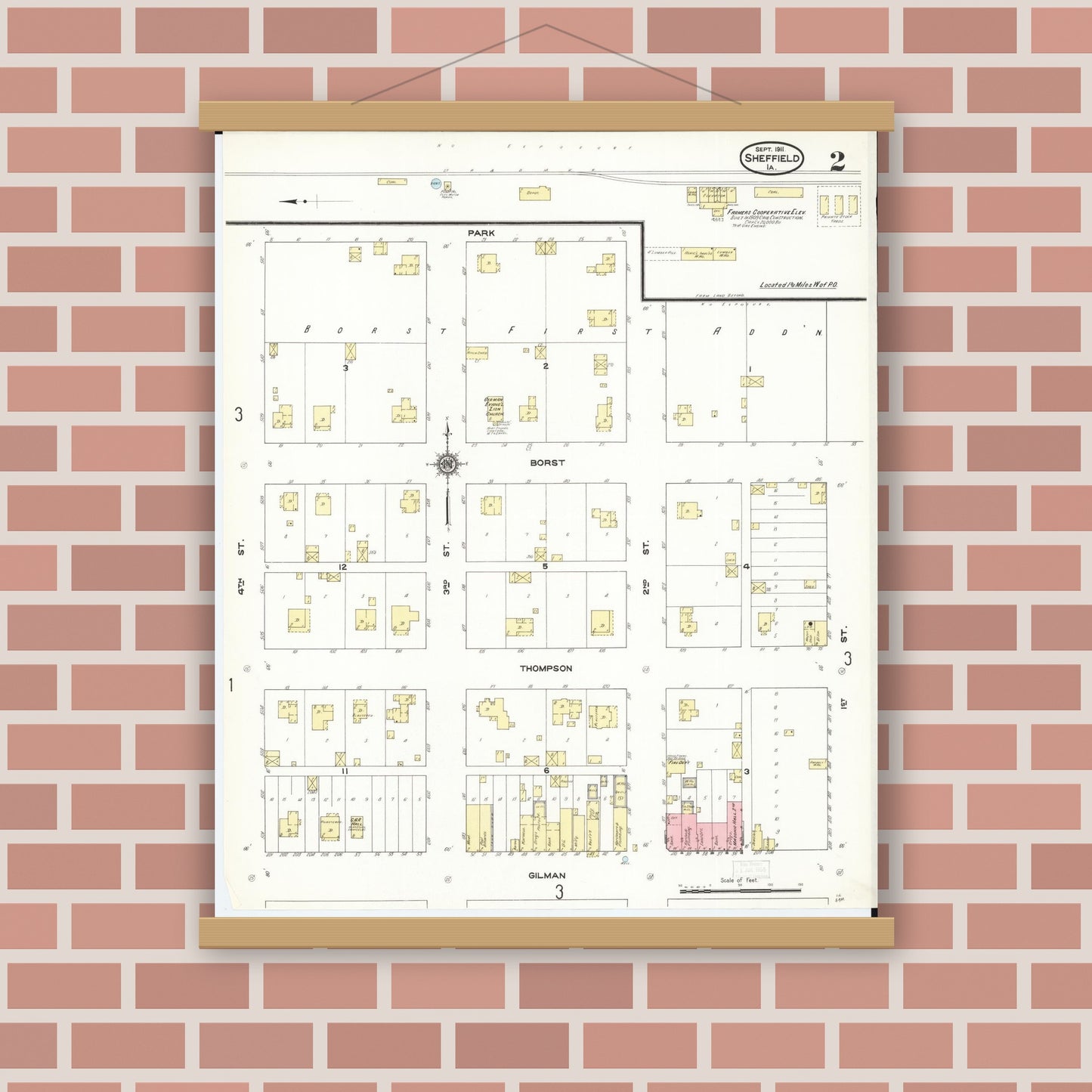Old map wall art mockup — magnetic wood frame on brick wall — Sanborn Fire Insurance Map from Sheffield, Franklin County, Iowa (1911), Sheet #0002