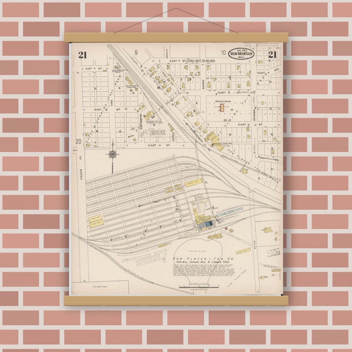 Old map wall art mockup — magnetic wood frame on brick wall — Sanborn Fire Insurance Map from Iron Mountain, Dickinson County, Michigan (1923), Sheet #0021