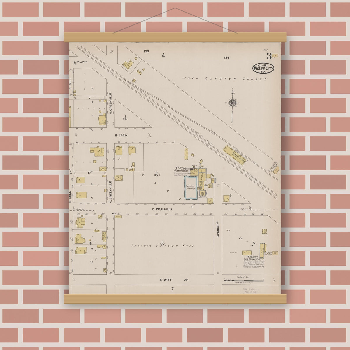 Old map wall art mockup — magnetic wood frame on brick wall — Sanborn Fire Insurance Map from Wolfe City, Hunt County, Texas (1922), Sheet #0003