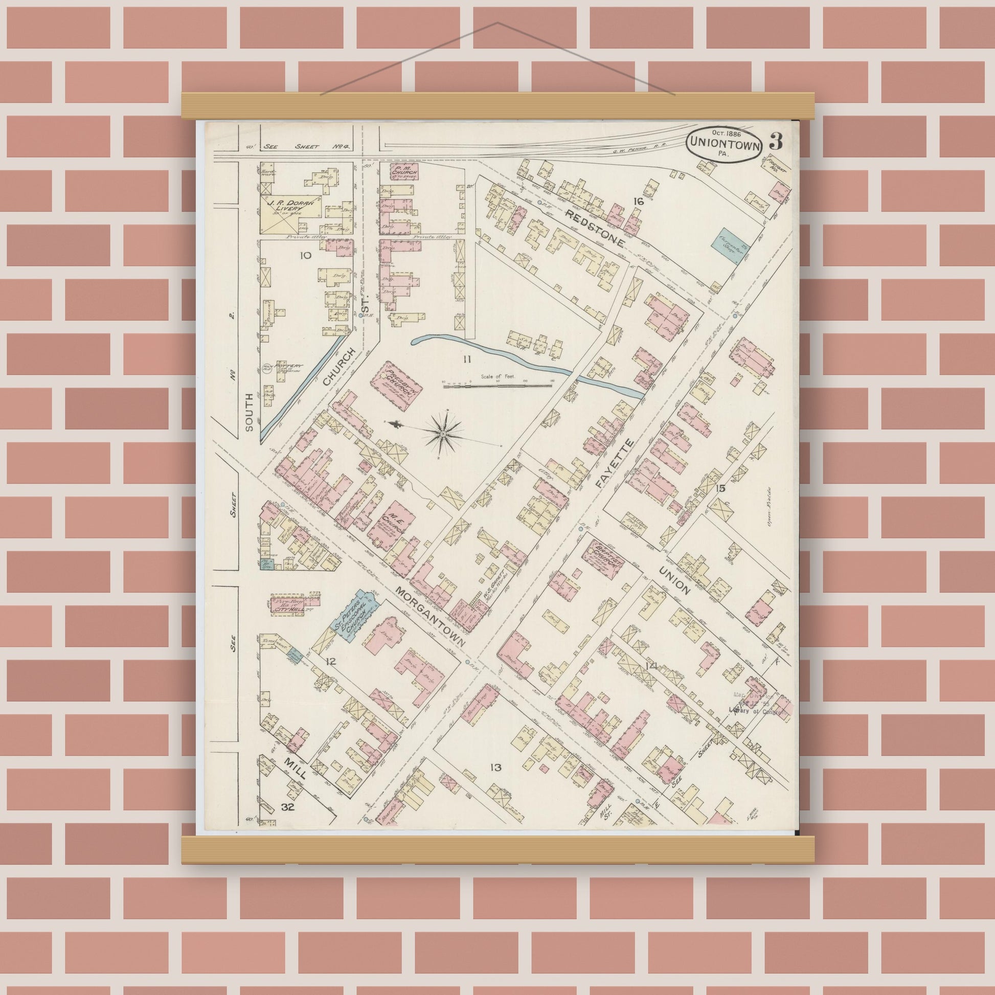Old map wall art mockup — magnetic wood frame on brick wall — Sanborn Fire Insurance Map from Uniontown, Fayette County, Pennsylvania (1886), Sheet #0003