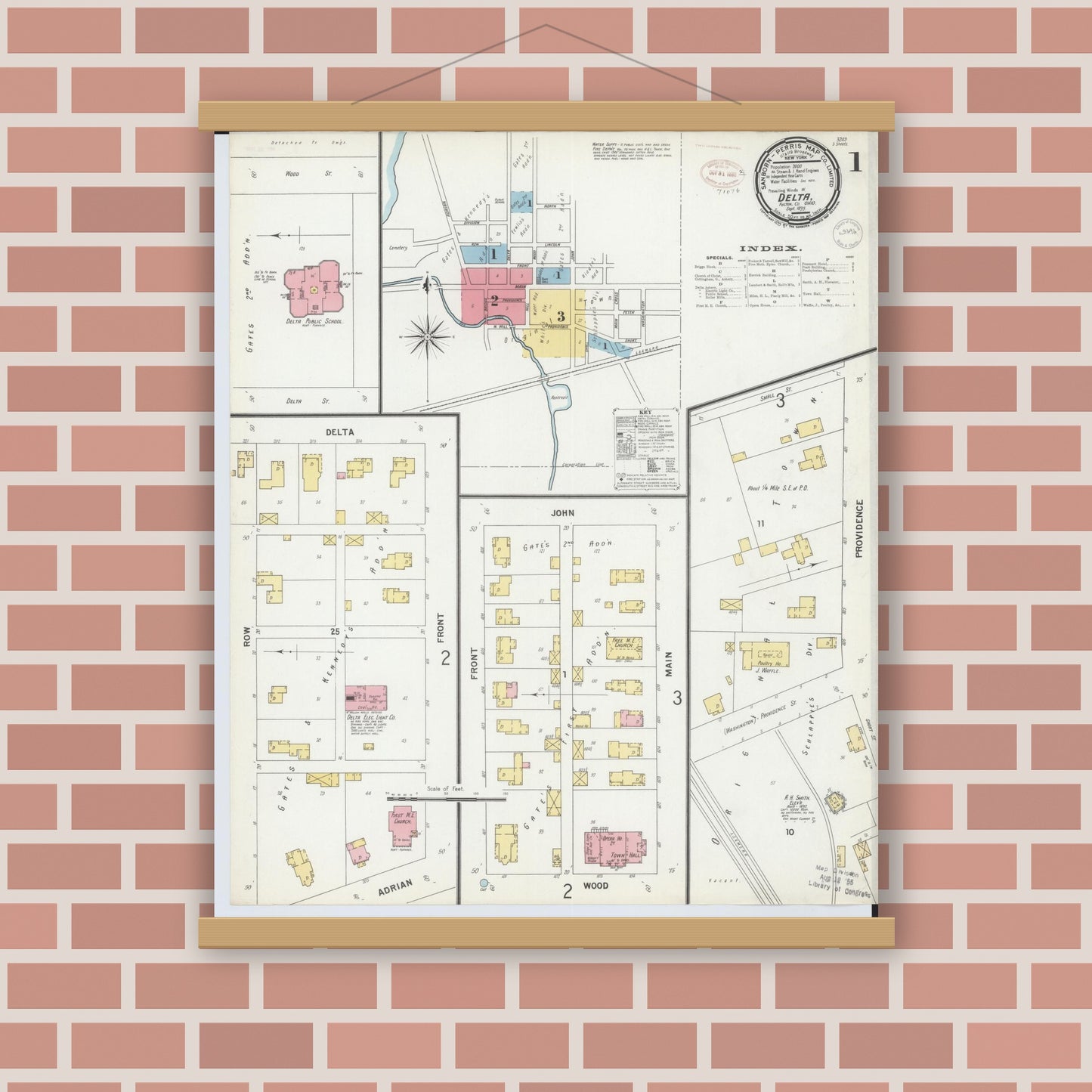 Old map wall art mockup — magnetic wood frame on brick wall — Sanborn Fire Insurance Map from Delta, Fulton County, Ohio (1899), Sheet #0001