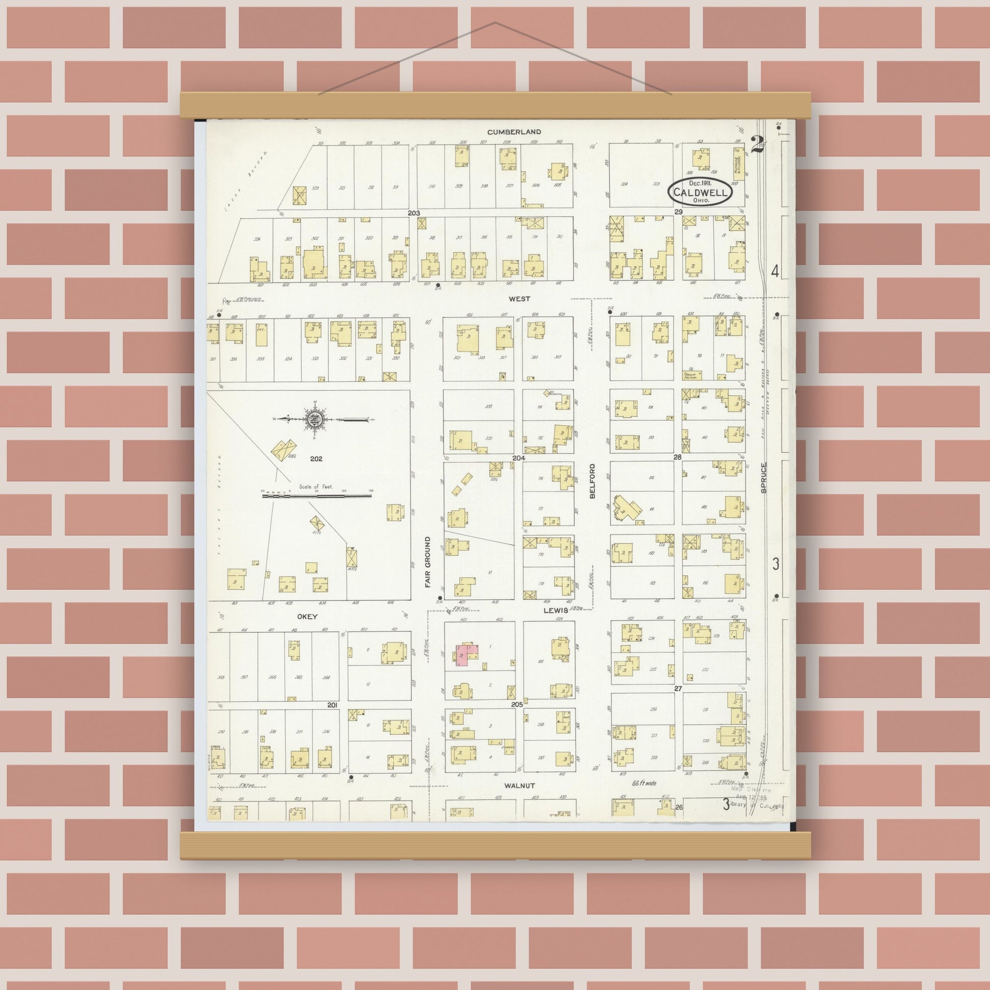 Old map wall art mockup — magnetic wood frame on brick wall — Sanborn Fire Insurance Map from Caldwell, Noble County, Ohio (1911), Sheet #0002