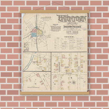 Old map wall art mockup — magnetic wood frame on brick wall — Sanborn Fire Insurance Map from Uniontown, Fayette County, Pennsylvania (1886), Sheet #0001