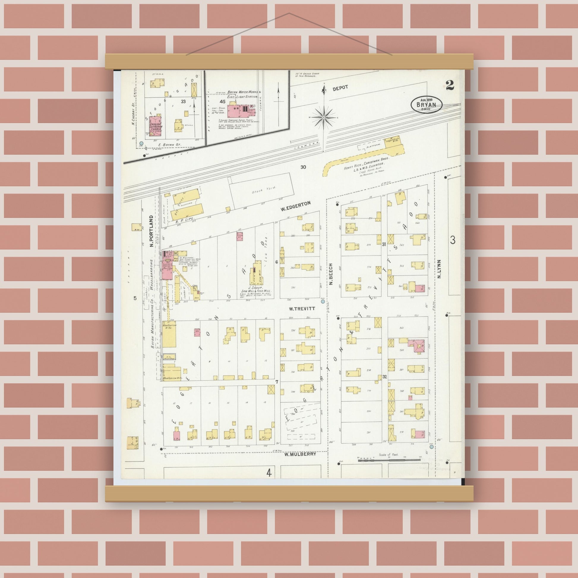 Old map wall art mockup — magnetic wood frame on brick wall — Sanborn Fire Insurance Map from Bryan, Williams County, Ohio (1899), Sheet #0002