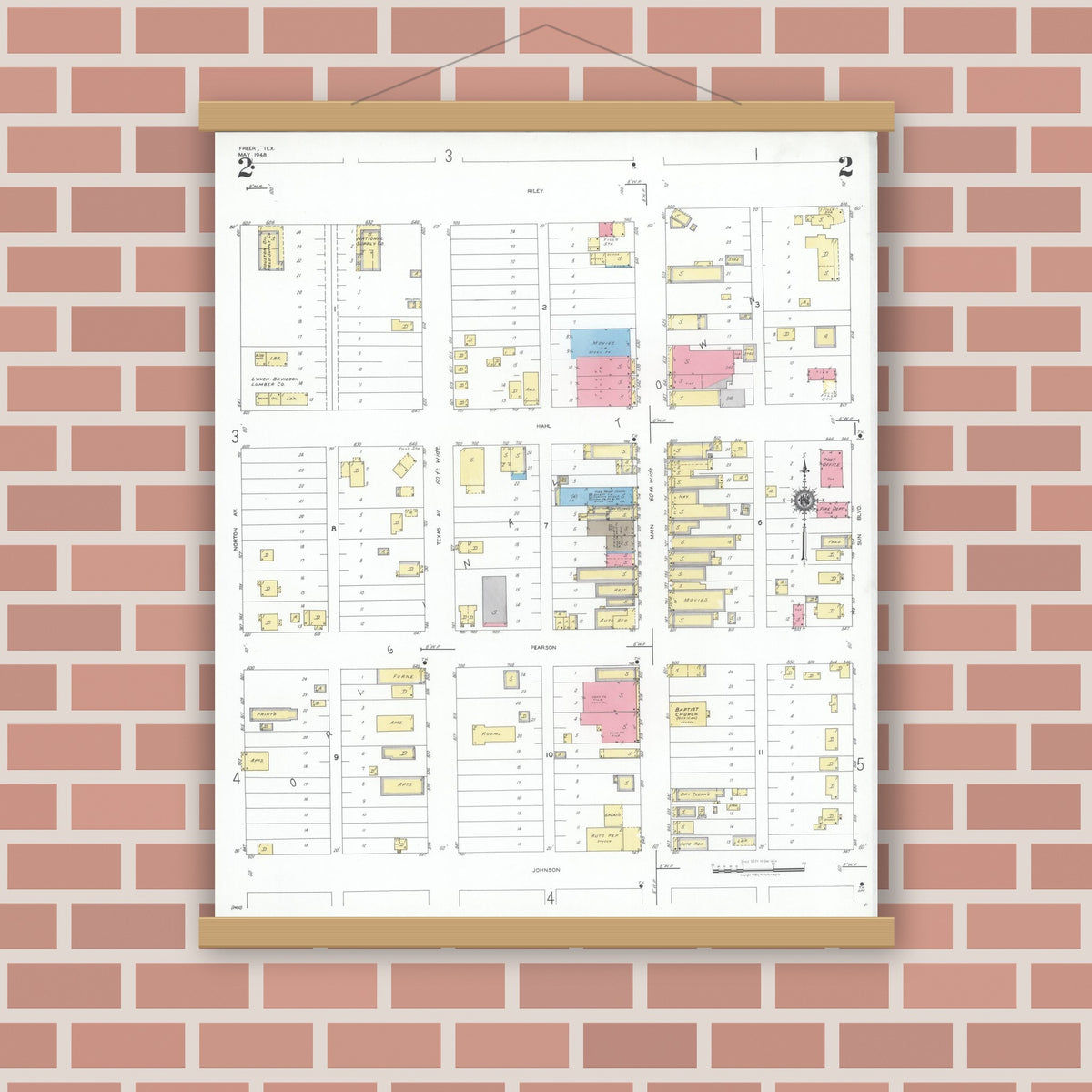 Old map wall art mockup — magnetic wood frame on brick wall — Sanborn Fire Insurance Map from Freer, Duval County, Texas (1948), Sheet #0002