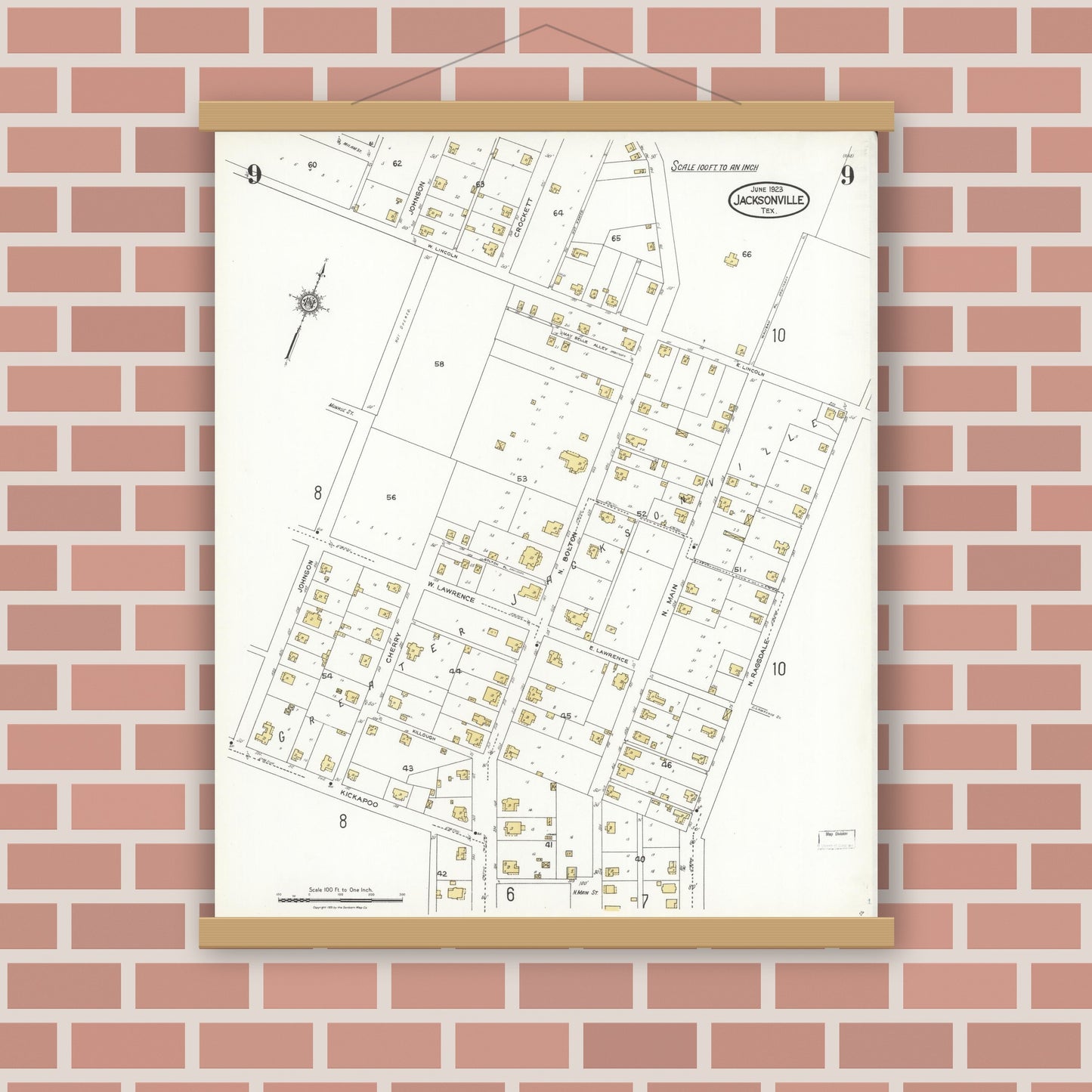 Old map wall art mockup — magnetic wood frame on brick wall — Sanborn Fire Insurance Map from Jacksonville, Cherokee County, Texas (1923), Sheet #0009