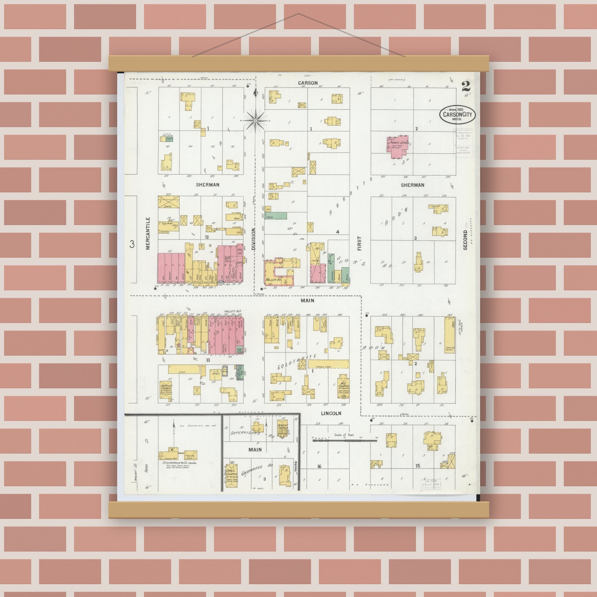 Old map wall art mockup — magnetic wood frame on brick wall — Sanborn Fire Insurance Map from Carson City, Montcalm County, Michigan (1900), Sheet #0002