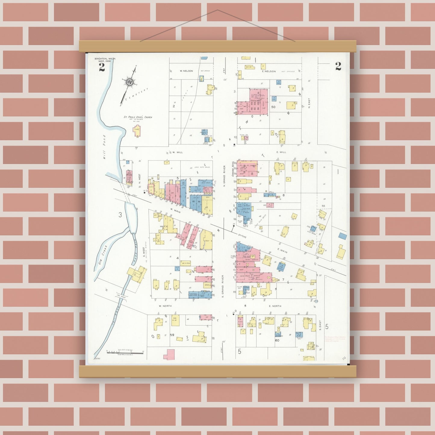 Old map wall art mockup — magnetic wood frame on brick wall — Sanborn Fire Insurance Map from Brighton, Livington County, Michigan (1938), Sheet #0002