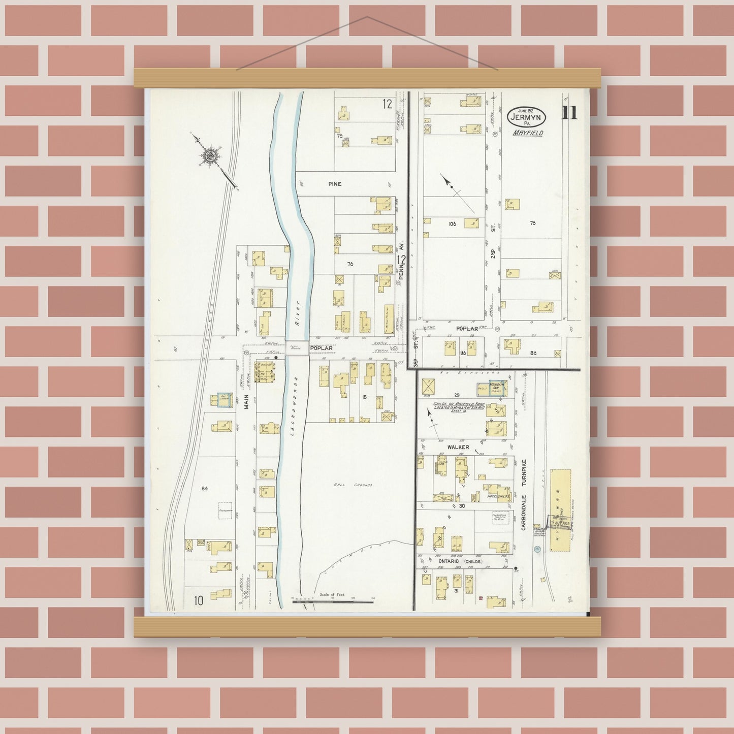 Old map wall art mockup — magnetic wood frame on brick wall — Sanborn Fire Insurance Map from Jermyn, Lackawanna County, Pennsylvania (1912), Sheet #0011