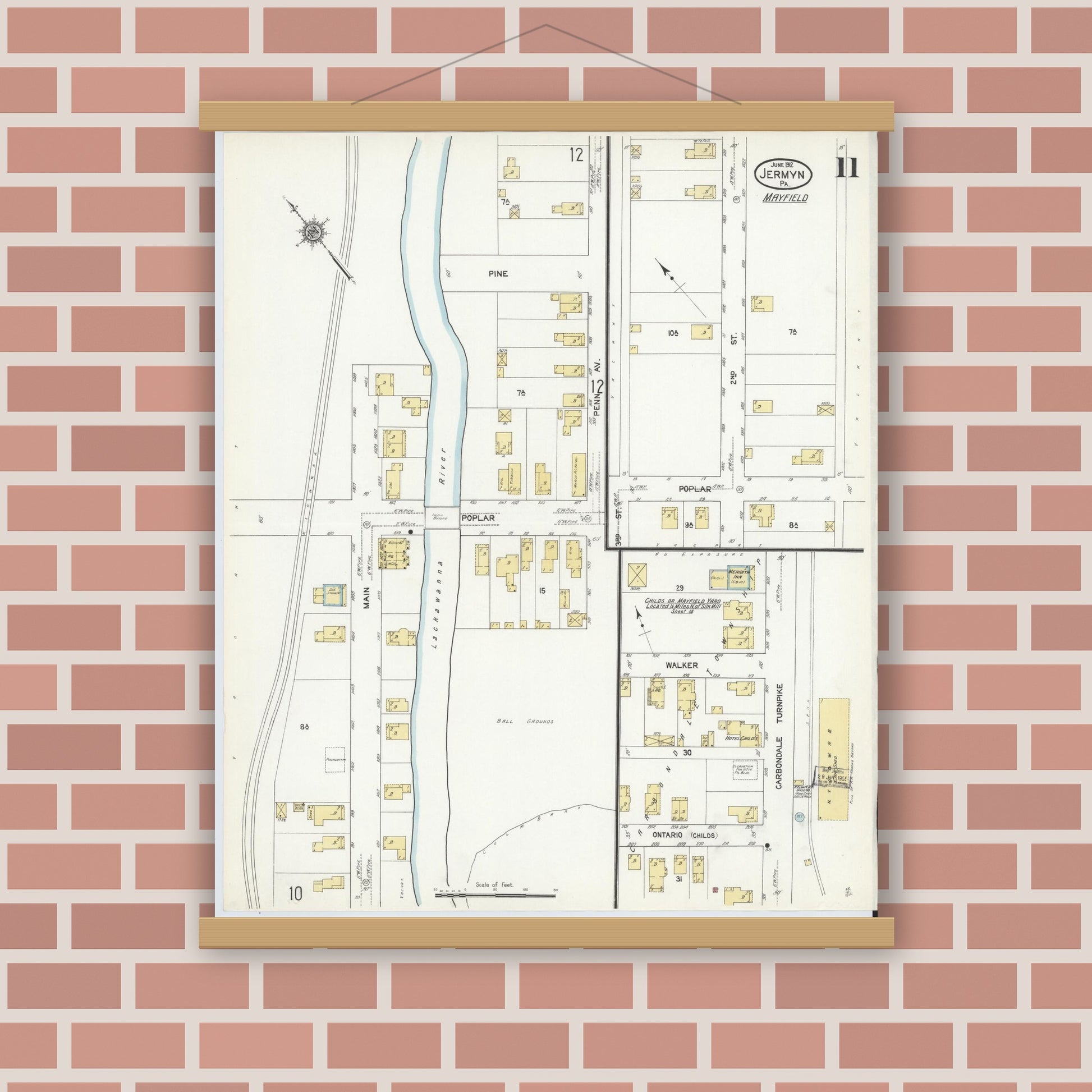 Old map wall art mockup — magnetic wood frame on brick wall — Sanborn Fire Insurance Map from Jermyn, Lackawanna County, Pennsylvania (1912), Sheet #0011
