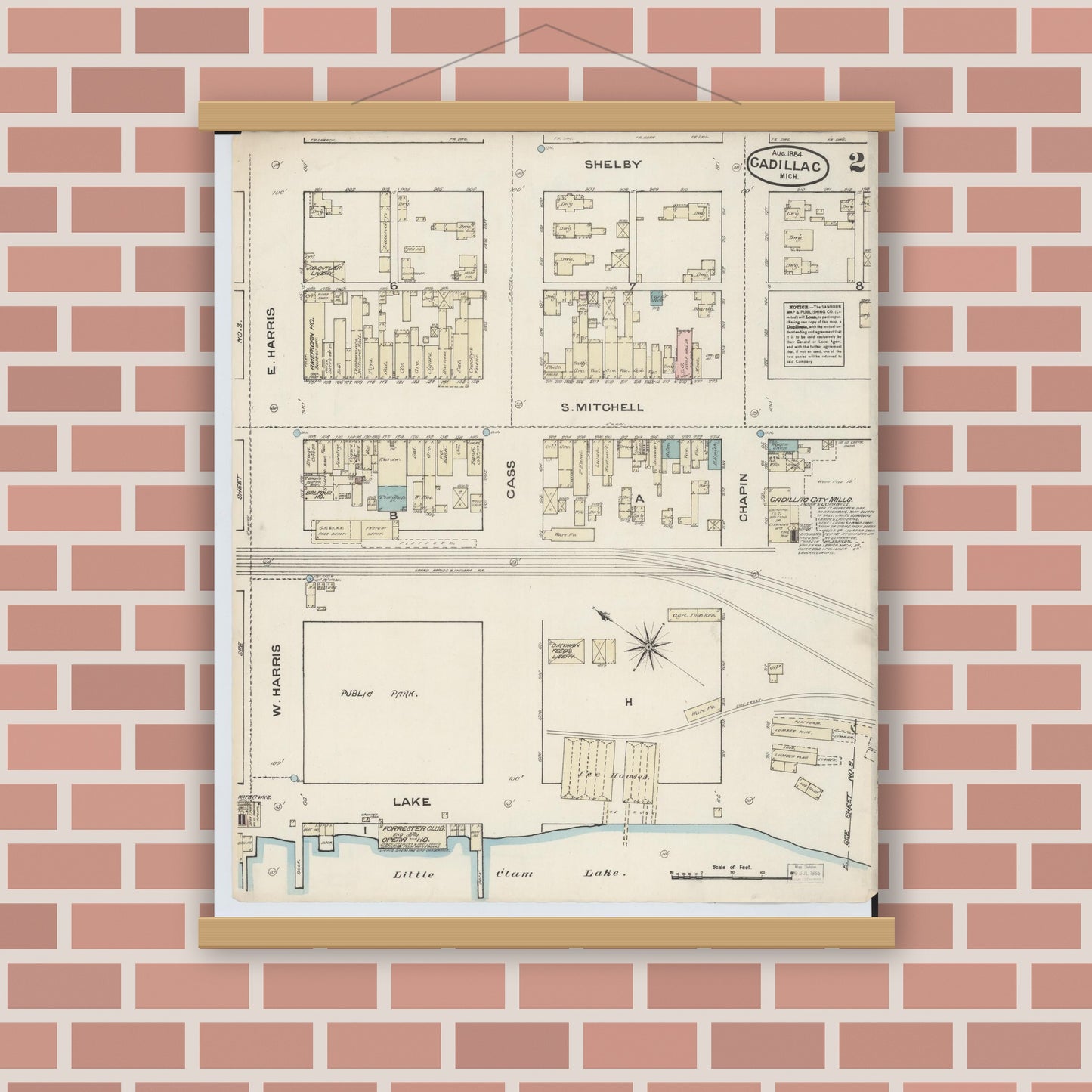 Old map wall art mockup — magnetic wood frame on brick wall — Sanborn Fire Insurance Map from Cadillac, Wexford County, Michigan (1884), Sheet #0002