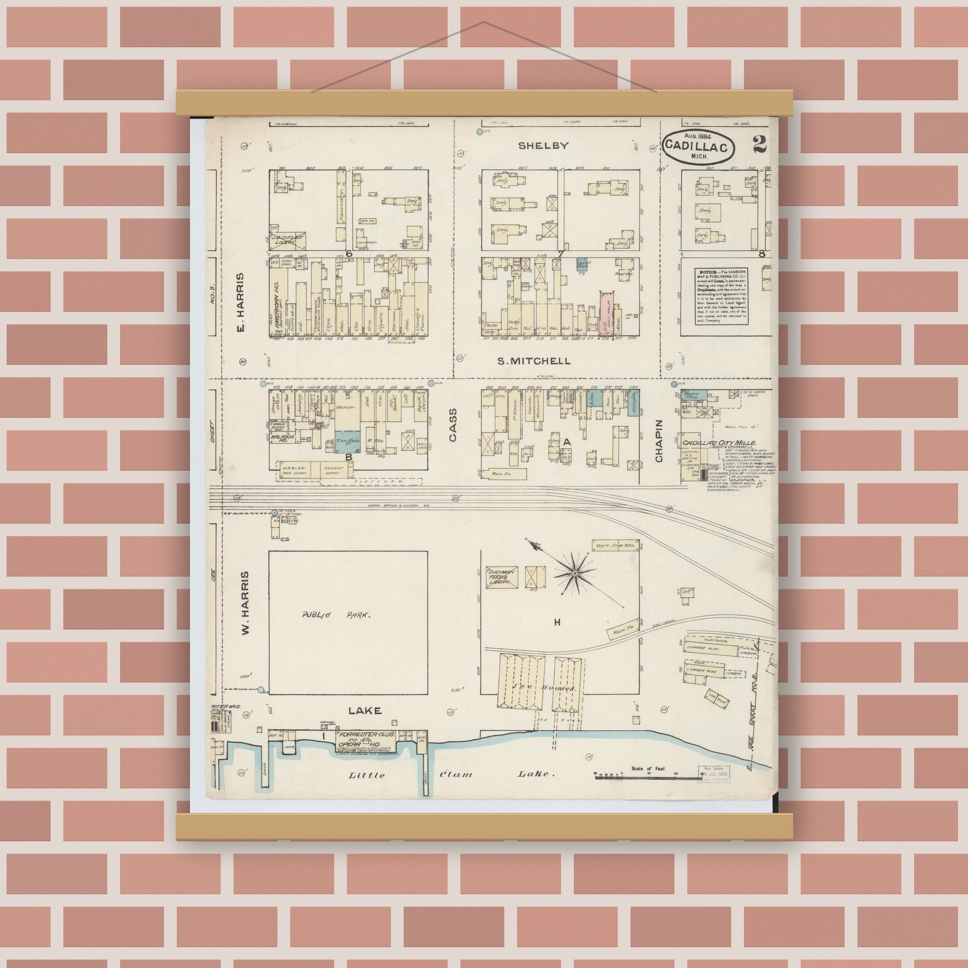 Old map wall art mockup — magnetic wood frame on brick wall — Sanborn Fire Insurance Map from Cadillac, Wexford County, Michigan (1884), Sheet #0002