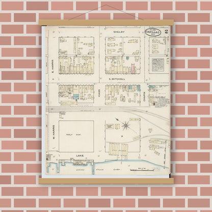 Old map wall art mockup — magnetic wood frame on brick wall — Sanborn Fire Insurance Map from Cadillac, Wexford County, Michigan (1884), Sheet #0002