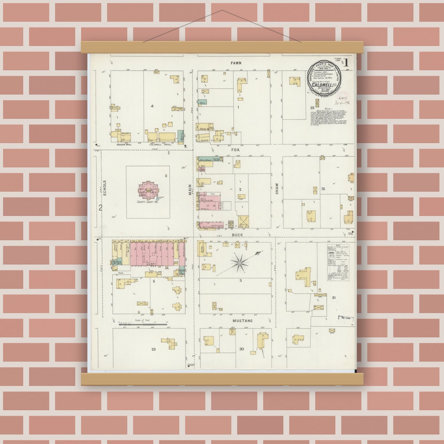 Old map wall art mockup — magnetic wood frame on brick wall — Sanborn Fire Insurance Map from Caldwell, Burleson County, Texas (1896), Sheet #0001