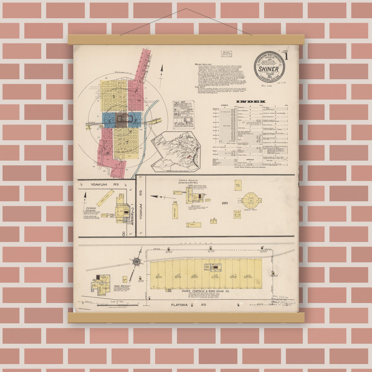 Old map wall art mockup — magnetic wood frame on brick wall — Sanborn Fire Insurance Map from Shiner, Lavaca County, Texas (1922), Sheet #0001
