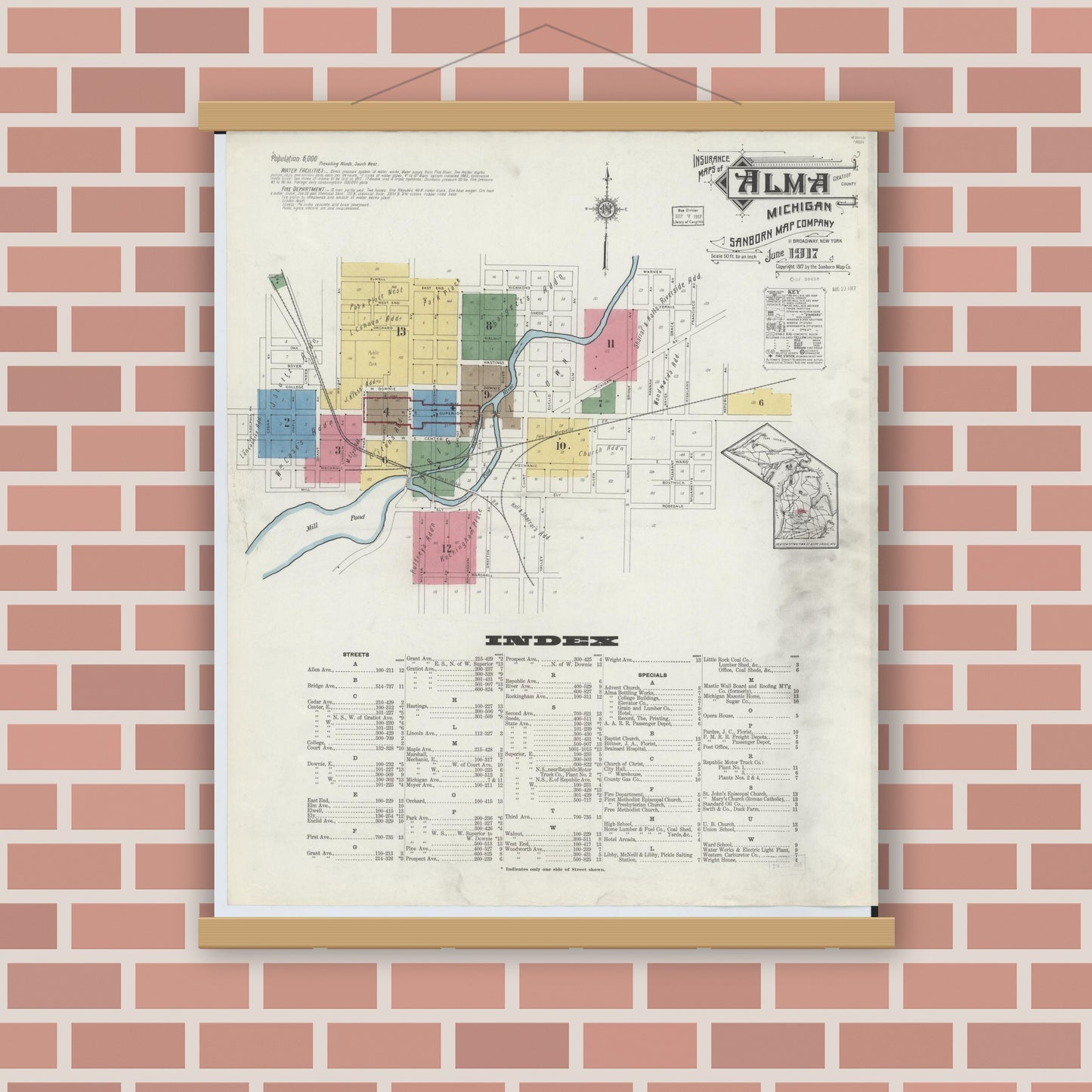 Old map wall art mockup — magnetic wood frame on brick wall — Sanborn Fire Insurance Map from Alma, Gratiot County, Michigan (1917), Sheet #0001