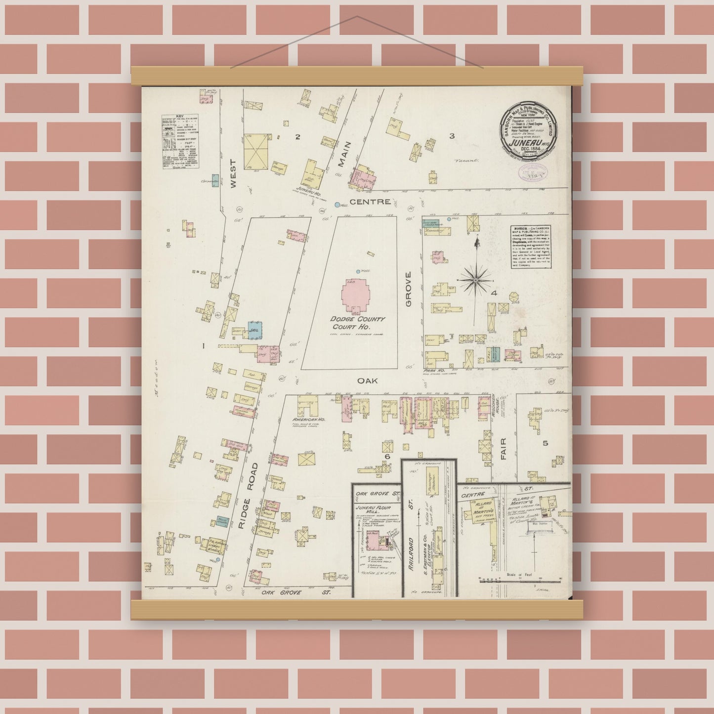 Old map wall art mockup — magnetic wood frame on brick wall — Sanborn Fire Insurance Map from Juneau, Dodge County, Wisconsin (1884), Sheet #0001