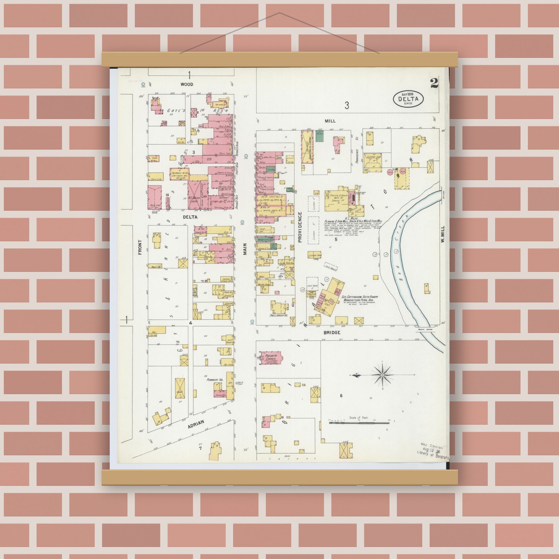 Old map wall art mockup — magnetic wood frame on brick wall — Sanborn Fire Insurance Map from Delta, Fulton County, Ohio (1899), Sheet #0002