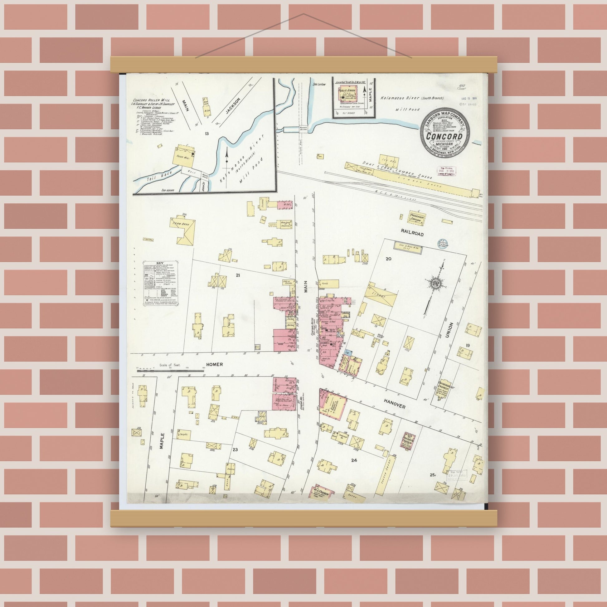 Old map wall art mockup — magnetic wood frame on brick wall — Sanborn Fire Insurance Map from Concord, Jackson County, Michigan (1911), Sheet #0001