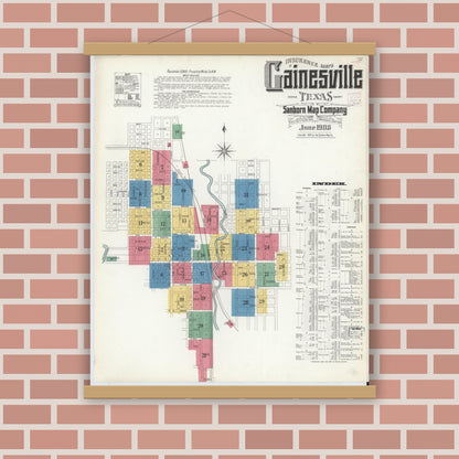 Old map wall art mockup — magnetic wood frame on brick wall — Sanborn Fire Insurance Map from Gainesville, Cooke County, Texas (1908), Sheet #0001