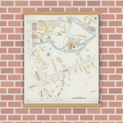 Old map wall art mockup — magnetic wood frame on brick wall — Sanborn Fire Insurance Map from Adams, Berkshire County, Massachusetts (1889), Sheet #0002