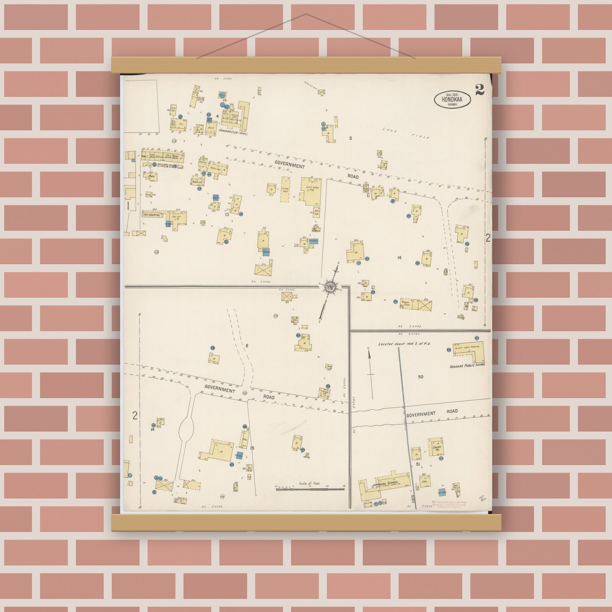 Old map wall art mockup — magnetic wood frame on brick wall — Sanborn Fire Insurance Map from Honokaa, Hawaii County, Hawaii (1914), Sheet #0002
