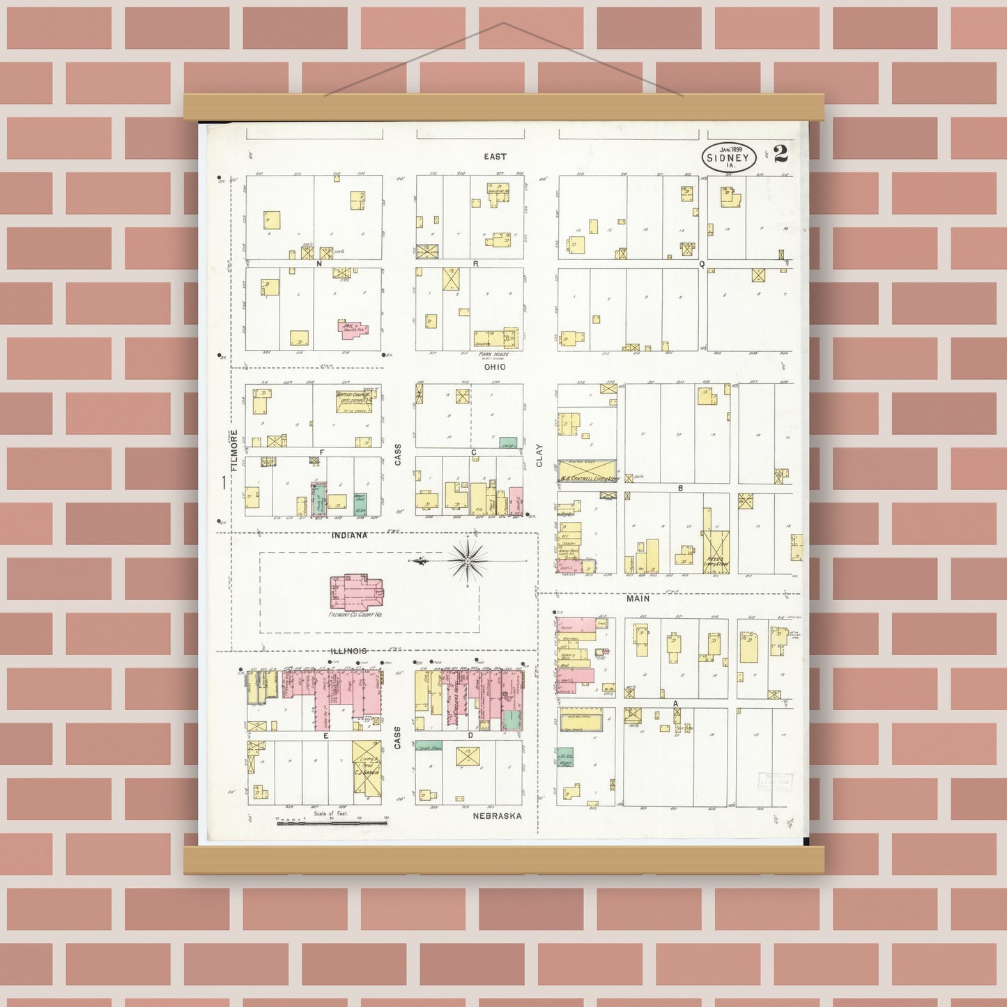 Old map wall art mockup — magnetic wood frame on brick wall — Sanborn Fire Insurance Map from Sidney, Fremont County, Iowa (1899), Sheet #0002