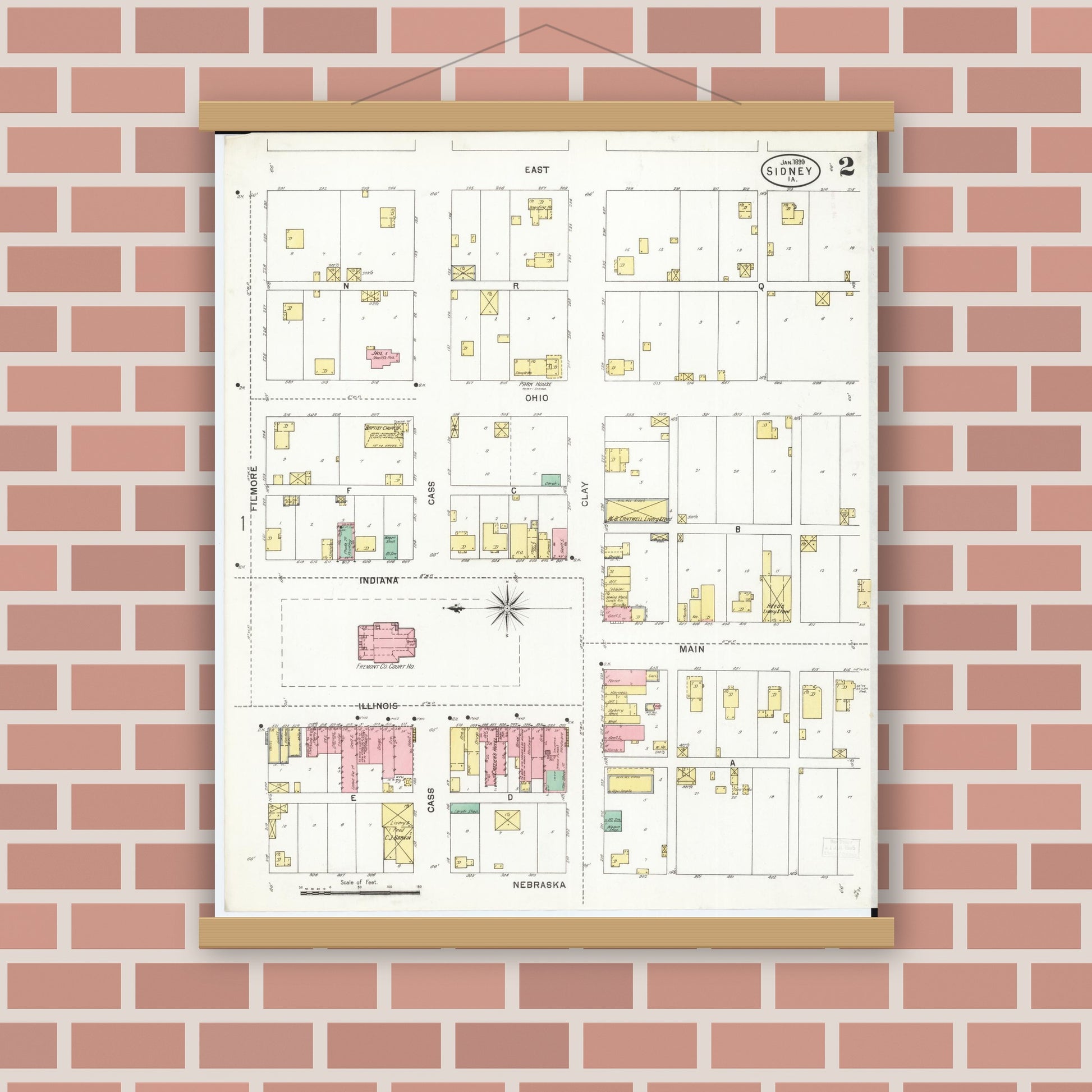 Old map wall art mockup — magnetic wood frame on brick wall — Sanborn Fire Insurance Map from Sidney, Fremont County, Iowa (1899), Sheet #0002