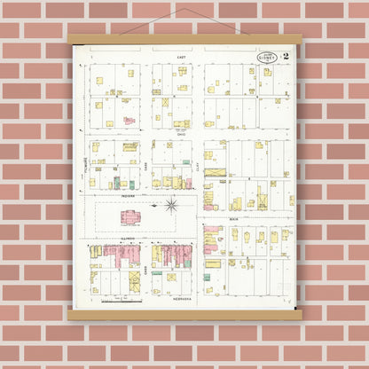 Old map wall art mockup — magnetic wood frame on brick wall — Sanborn Fire Insurance Map from Sidney, Fremont County, Iowa (1899), Sheet #0002
