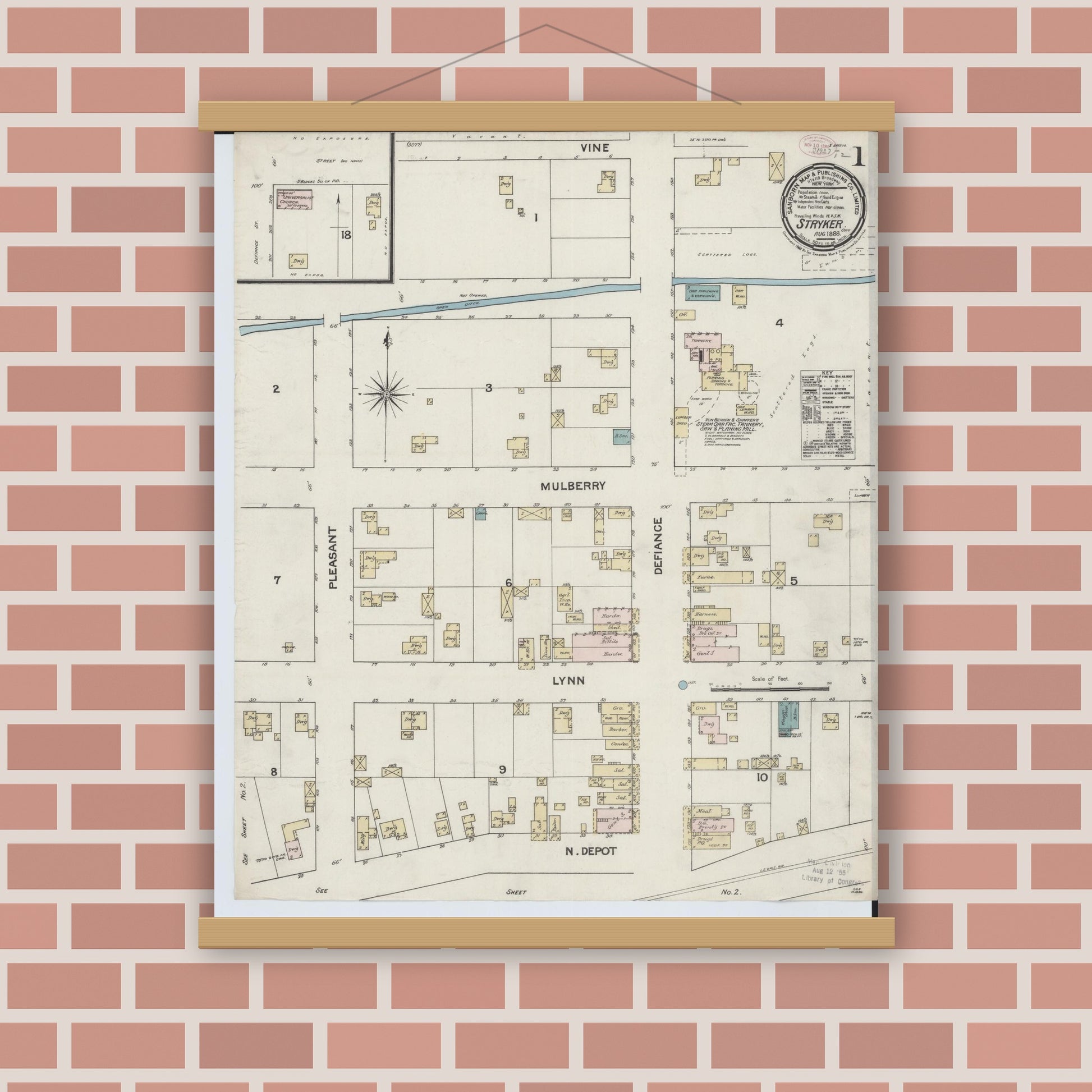 Old map wall art mockup — magnetic wood frame on brick wall — Sanborn Fire Insurance Map from Stryker, Williams County, Ohio (1888), Sheet #0001