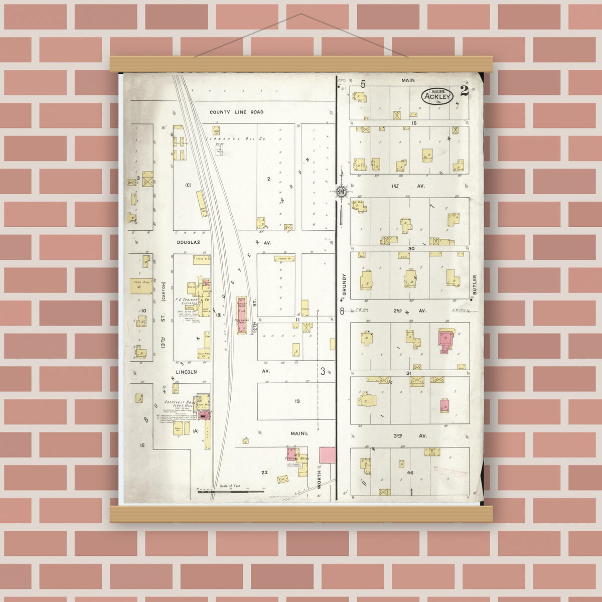 Old map wall art mockup — magnetic wood frame on brick wall — Sanborn Fire Insurance Map from Ackley, Hardin and Franklin Counties, Iowa (1916), Sheet #0002