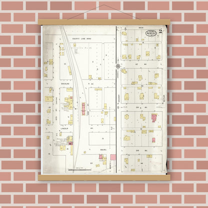 Old map wall art mockup — magnetic wood frame on brick wall — Sanborn Fire Insurance Map from Ackley, Hardin and Franklin Counties, Iowa (1916), Sheet #0002