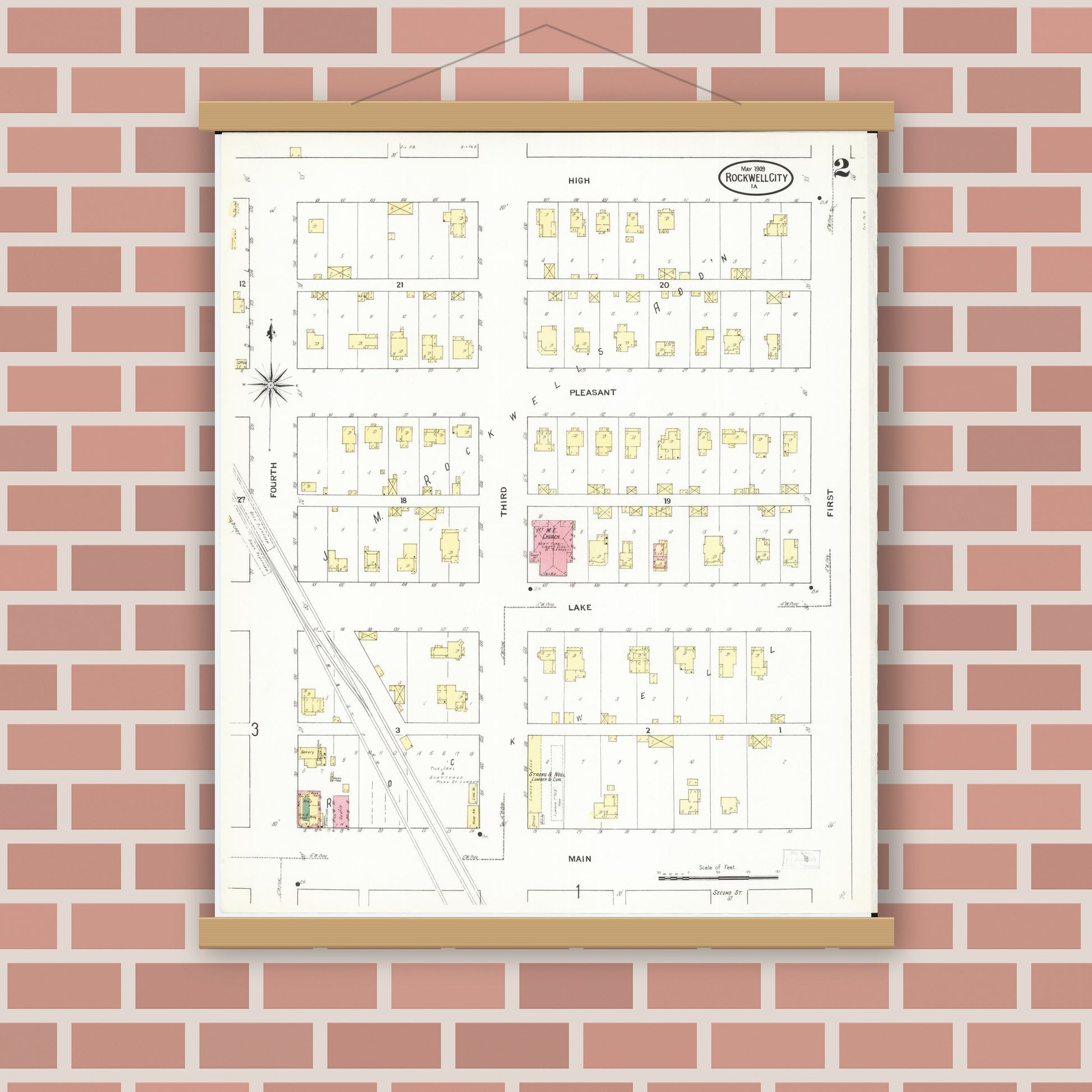 Old map wall art mockup — magnetic wood frame on brick wall — Sanborn Fire Insurance Map from Rockwell City, Calhoun County, Iowa (1909), Sheet #0002
