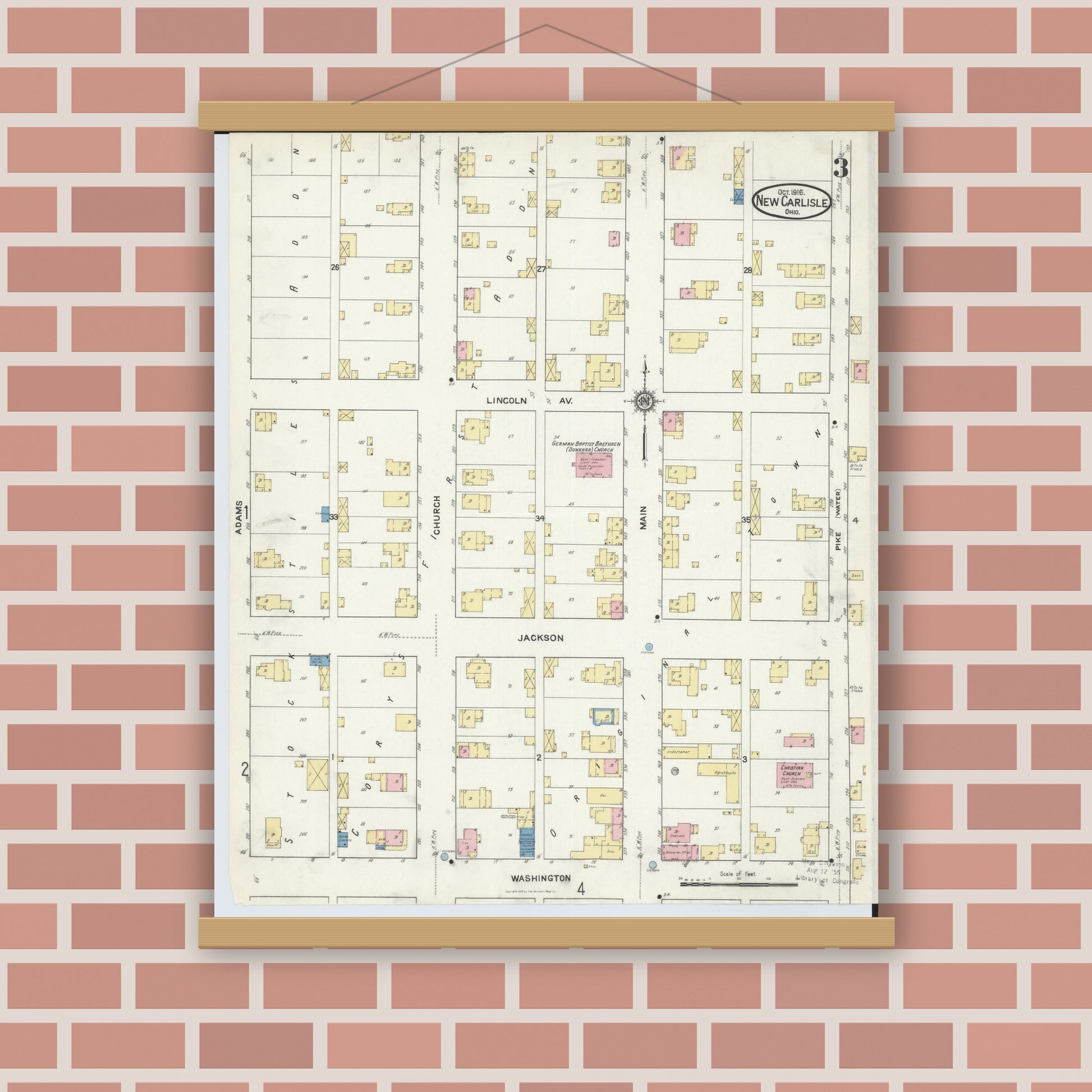 Old map wall art mockup — magnetic wood frame on brick wall — Sanborn Fire Insurance Map from New Carlisle, Clarke County, Ohio (1916), Sheet #0003
