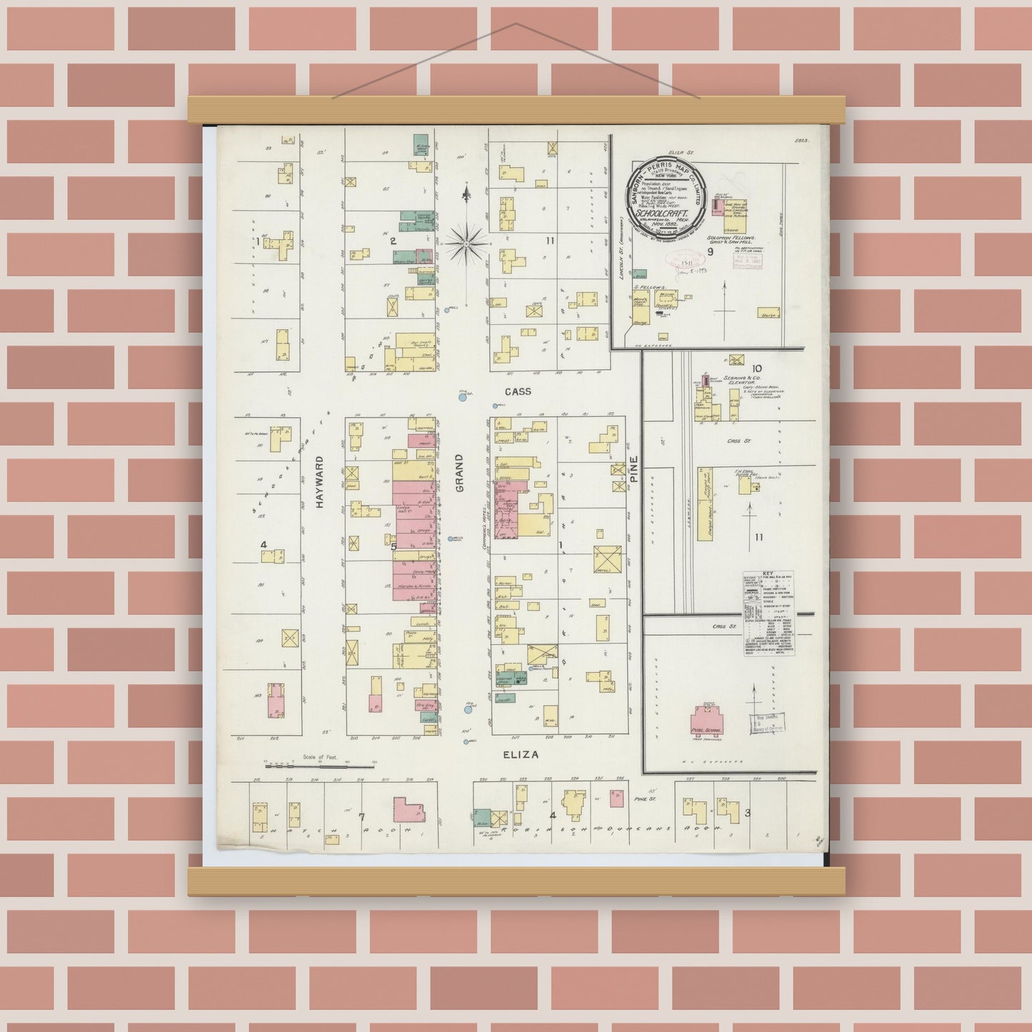 Old map wall art mockup — magnetic wood frame on brick wall — Sanborn Fire Insurance Map from Schoolcraft, Kalamazoo County, Michigan (1892), Sheet #0001