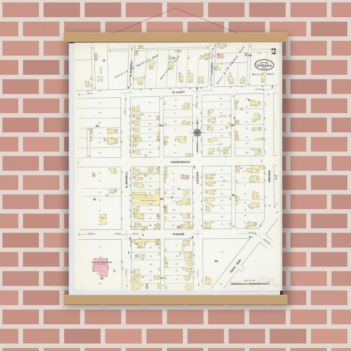 Old map wall art mockup — magnetic wood frame on brick wall — Sanborn Fire Insurance Map from Urbana, Champaign County, Ohio (1910), Sheet #0002