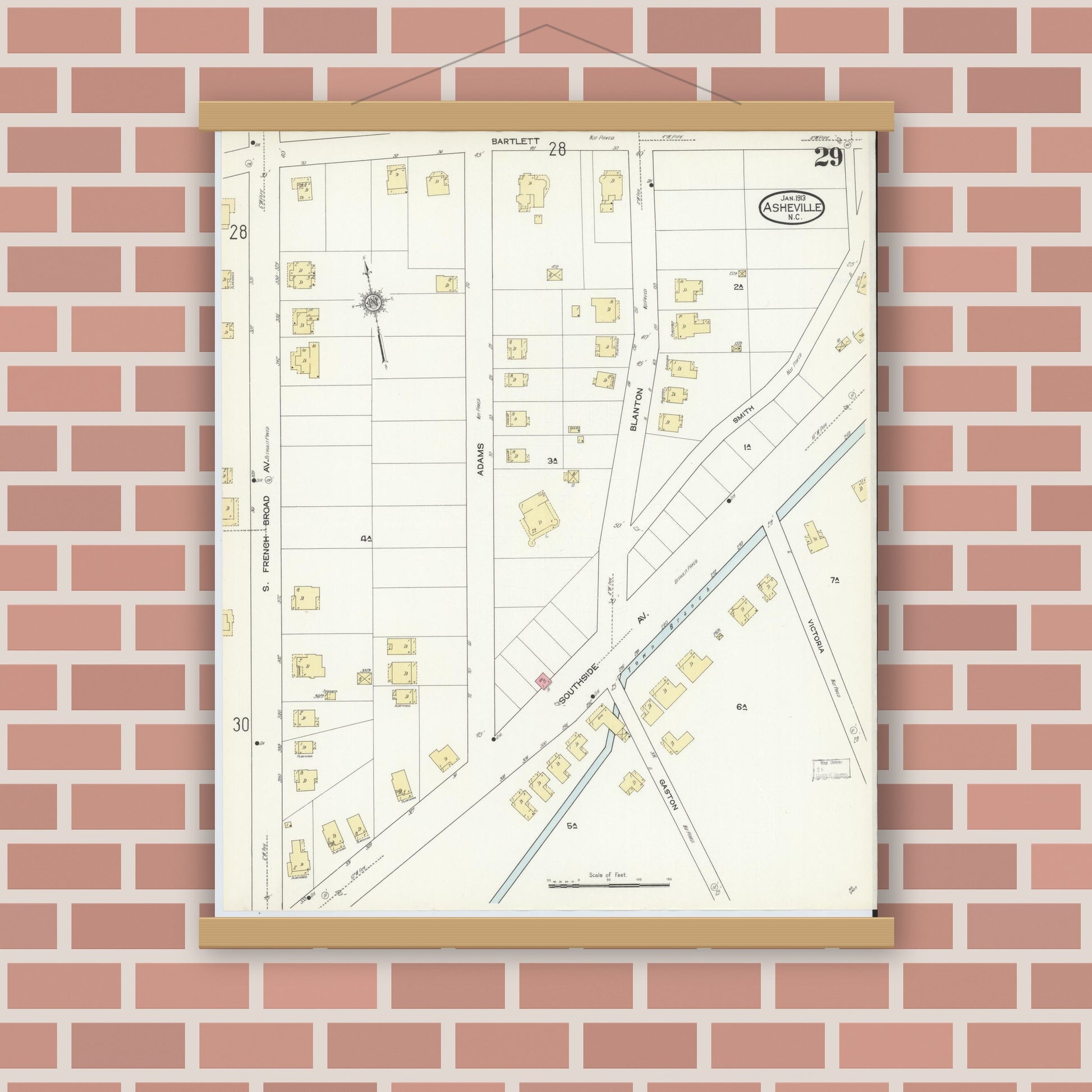 Old map wall art mockup — magnetic wood frame on brick wall — Sanborn Fire Insurance Map from Asheville, Buncombe County, North Carolina (1913), Sheet #0029