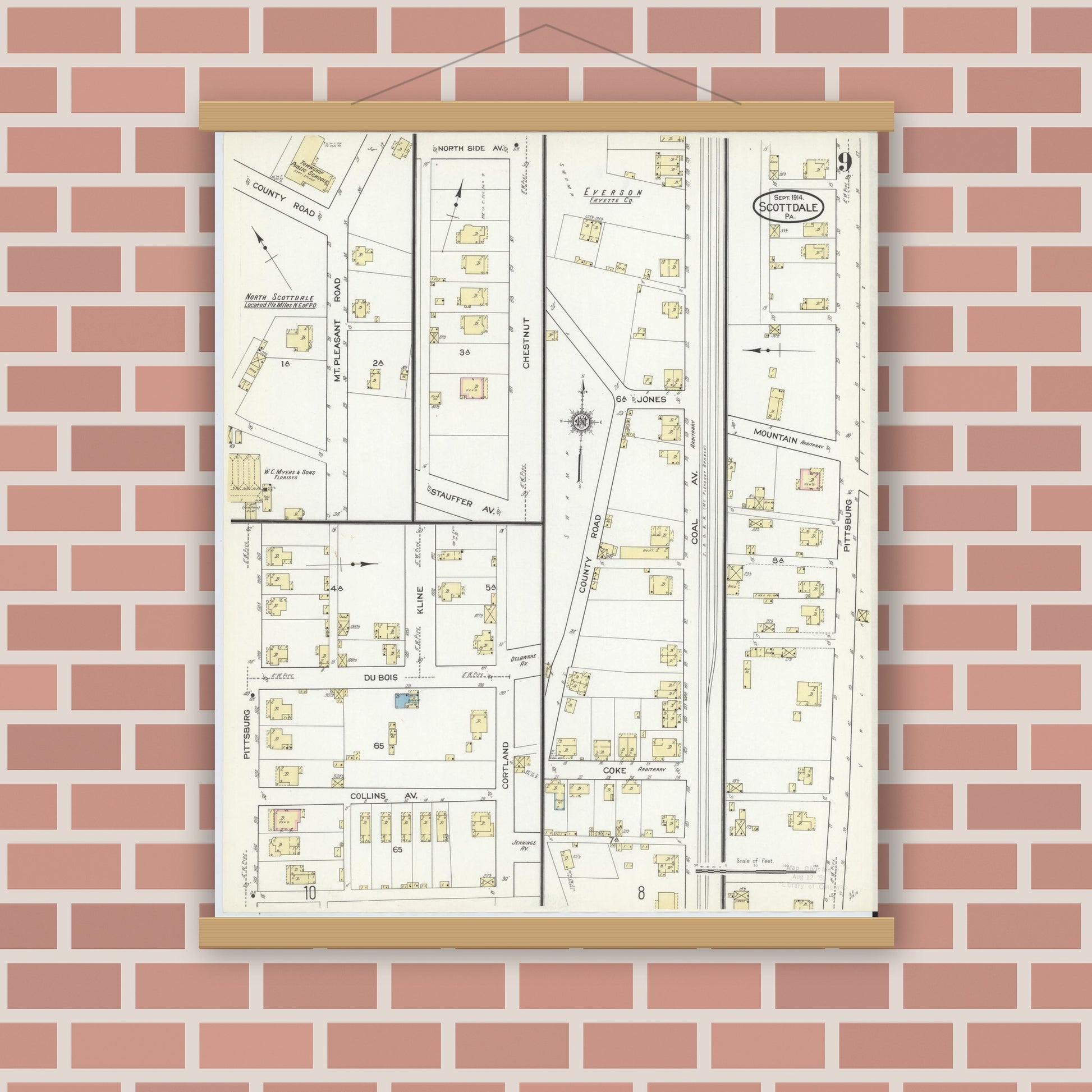 Old map wall art mockup — magnetic wood frame on brick wall — Sanborn Fire Insurance Map from Scottdale, Westmoreland County, Pennsylvania (1914), Sheet #0009