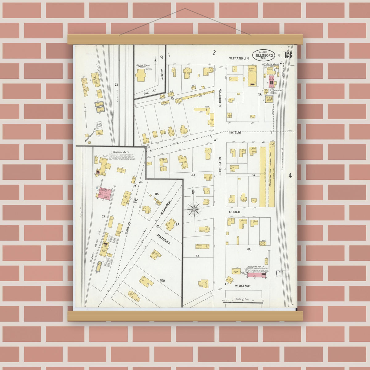 Old map wall art mockup — magnetic wood frame on brick wall — Sanborn Fire Insurance Map from Hillsboro, Hill County, Texas (1900), Sheet #0013