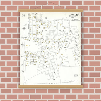 Old map wall art mockup — magnetic wood frame on brick wall — Sanborn Fire Insurance Map from Wakefield, Middlesex County, Massachusetts (1923), Sheet #0030