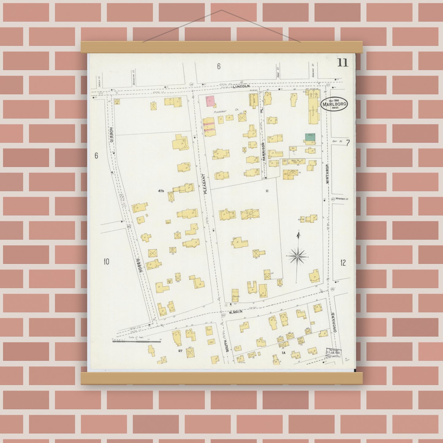 Old map wall art mockup — magnetic wood frame on brick wall — Sanborn Fire Insurance Map from Marlborough, Middlesex County, Massachusetts (1906), Sheet #0011
