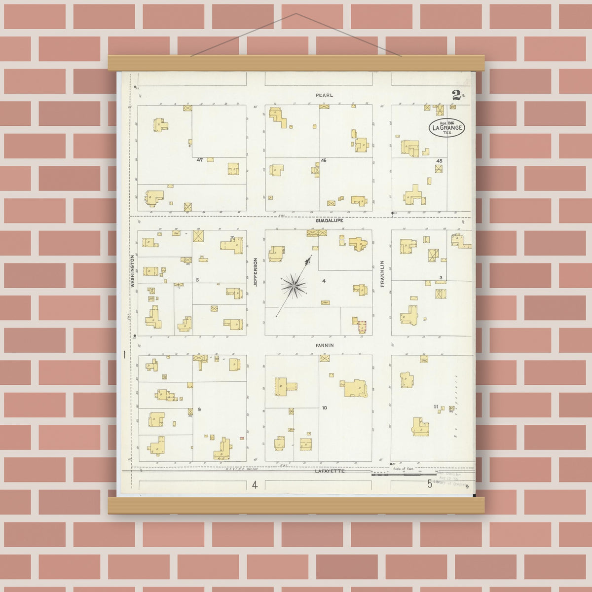 Old map wall art mockup — magnetic wood frame on brick wall — Sanborn Fire Insurance Map from La Grange, Fayette County, Texas (1906), Sheet #0002