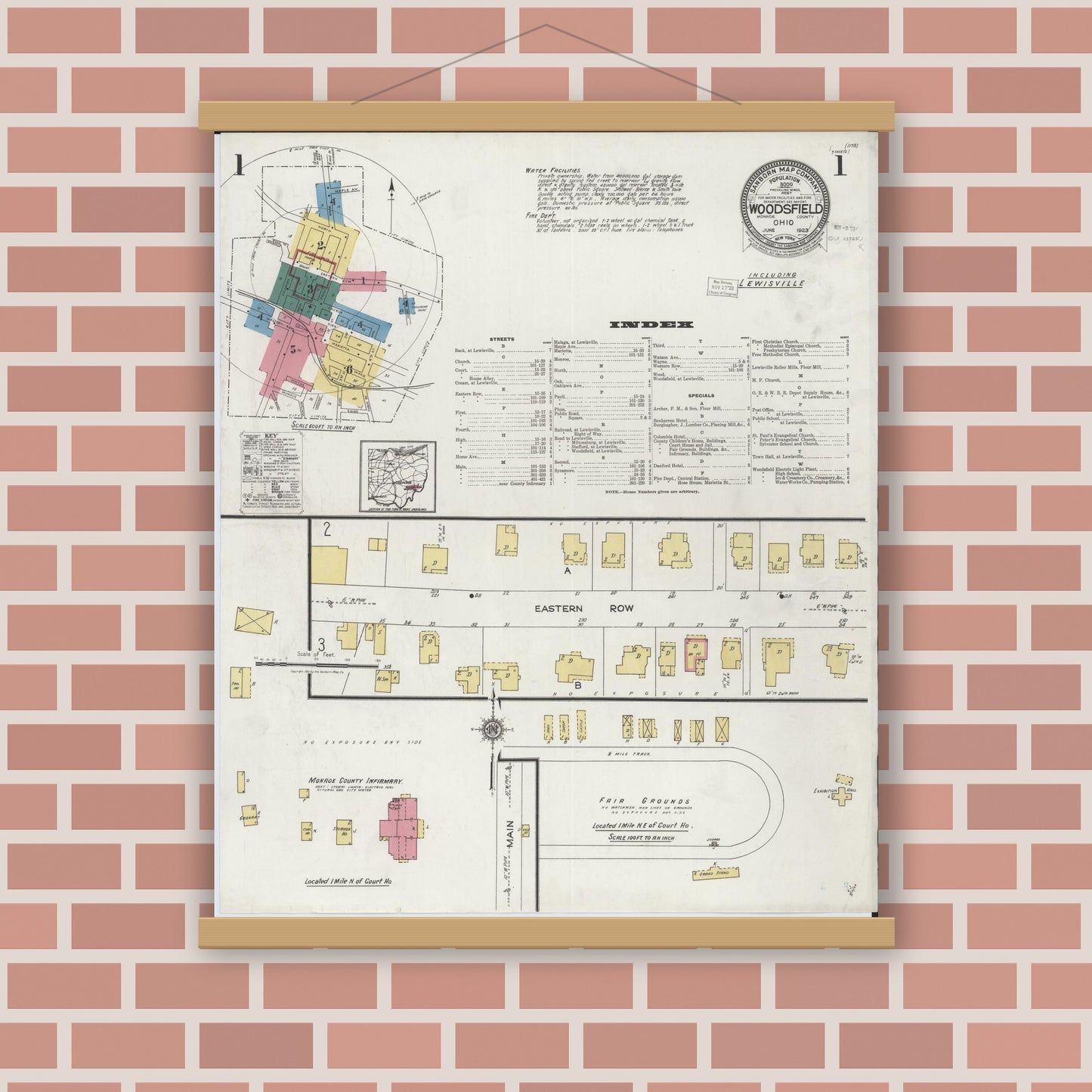 Old map wall art mockup — magnetic wood frame on brick wall — Sanborn Fire Insurance Map from Woodsfield, Monroe County, Ohio (1923), Sheet #0001