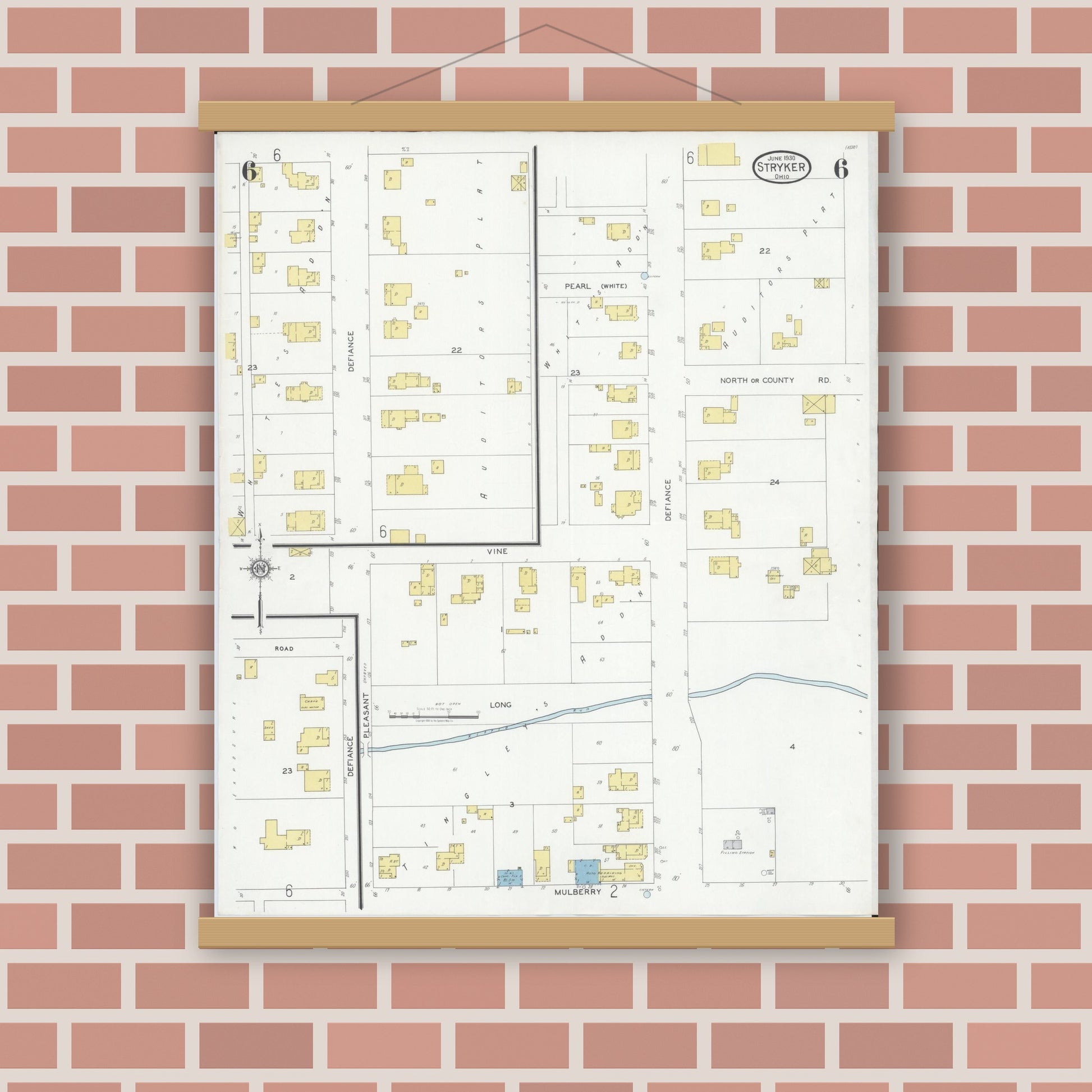 Old map wall art mockup — magnetic wood frame on brick wall — Sanborn Fire Insurance Map from Stryker, Williams County, Ohio (1930), Sheet #0006