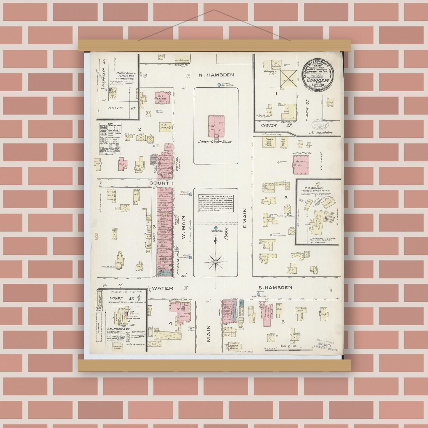 Old map wall art mockup — magnetic wood frame on brick wall — Sanborn Fire Insurance Map from Chardon, Geauga County, Ohio (1884), Sheet #0001