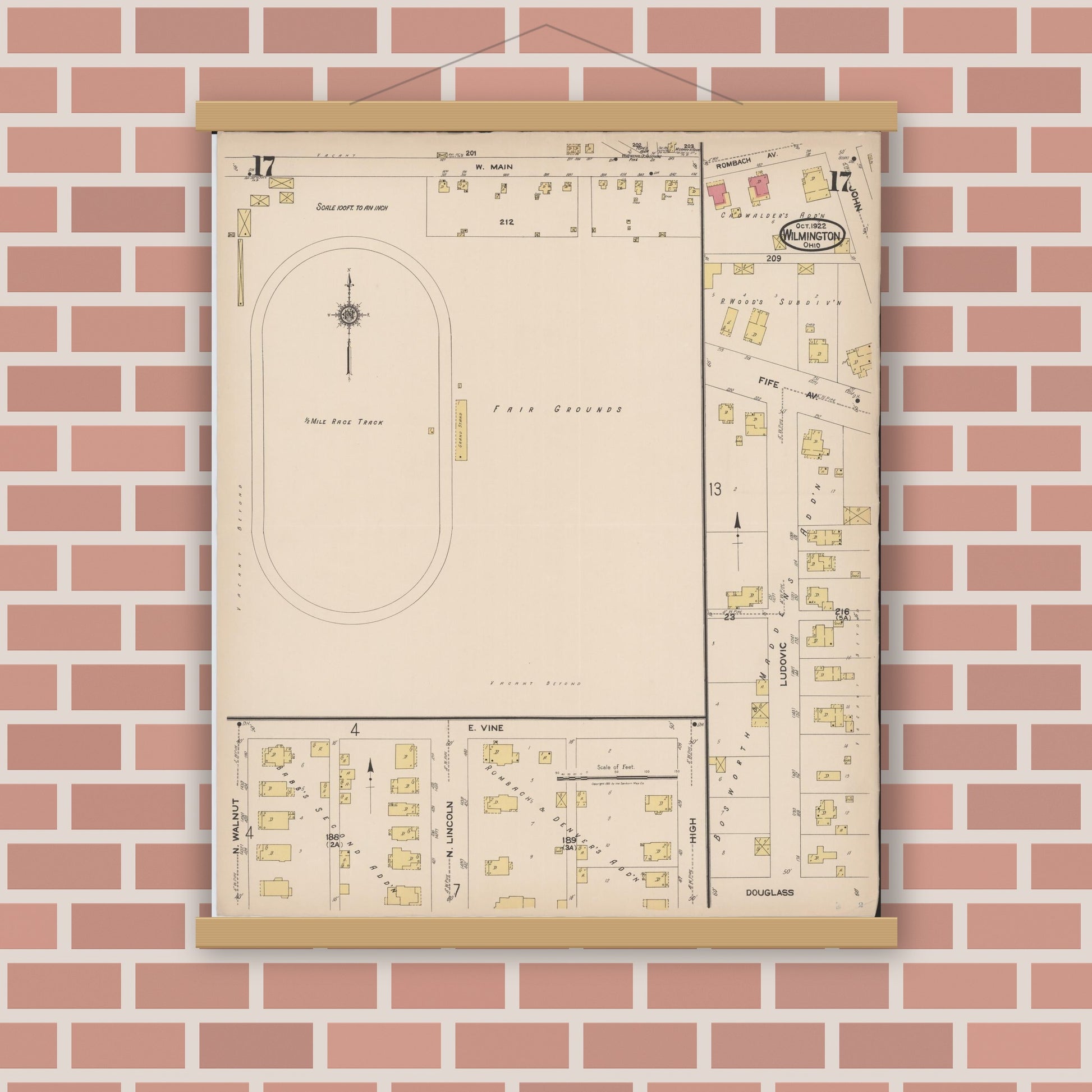 Old map wall art mockup — magnetic wood frame on brick wall — Sanborn Fire Insurance Map from Wilmington, Clinton County, Ohio (1922), Sheet #0017