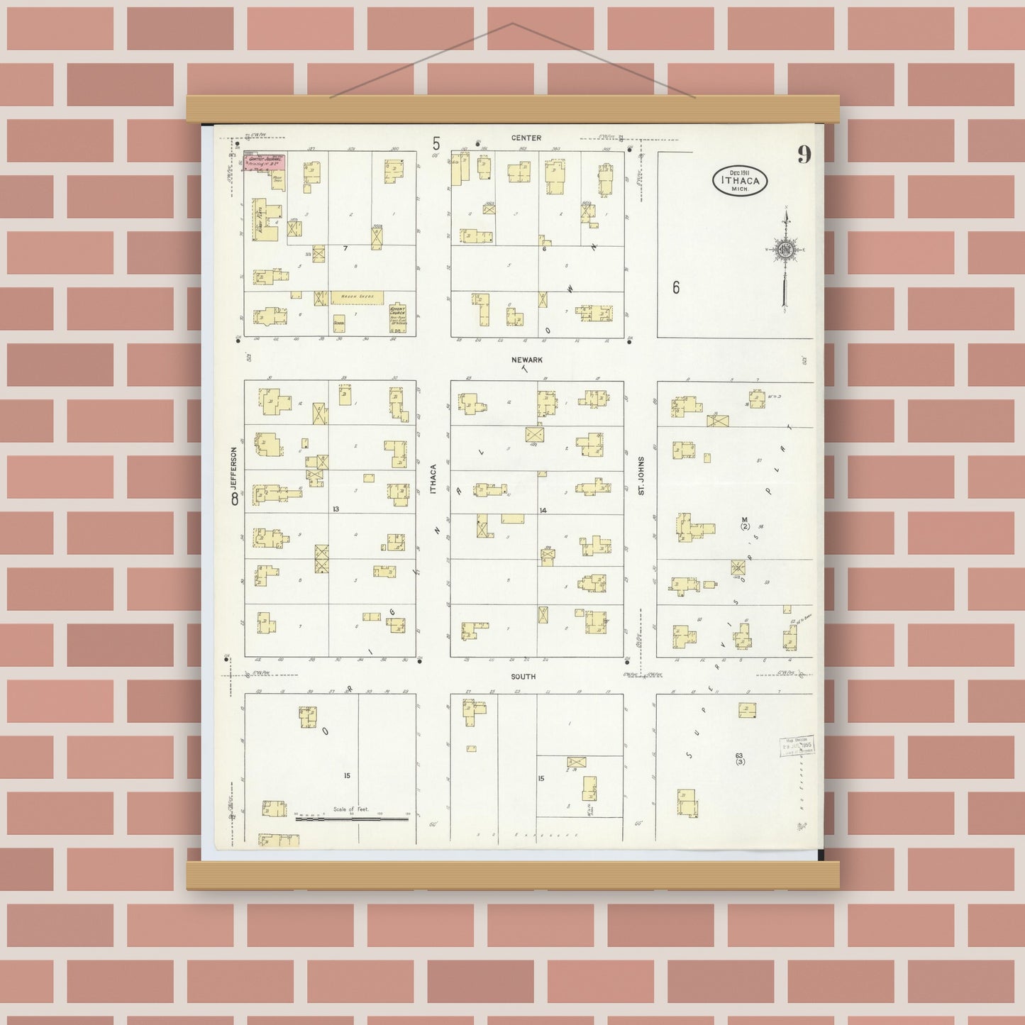 Old map wall art mockup — magnetic wood frame on brick wall — Sanborn Fire Insurance Map from Ithaca, Gratiot County, Michigan (1911), Sheet #0009