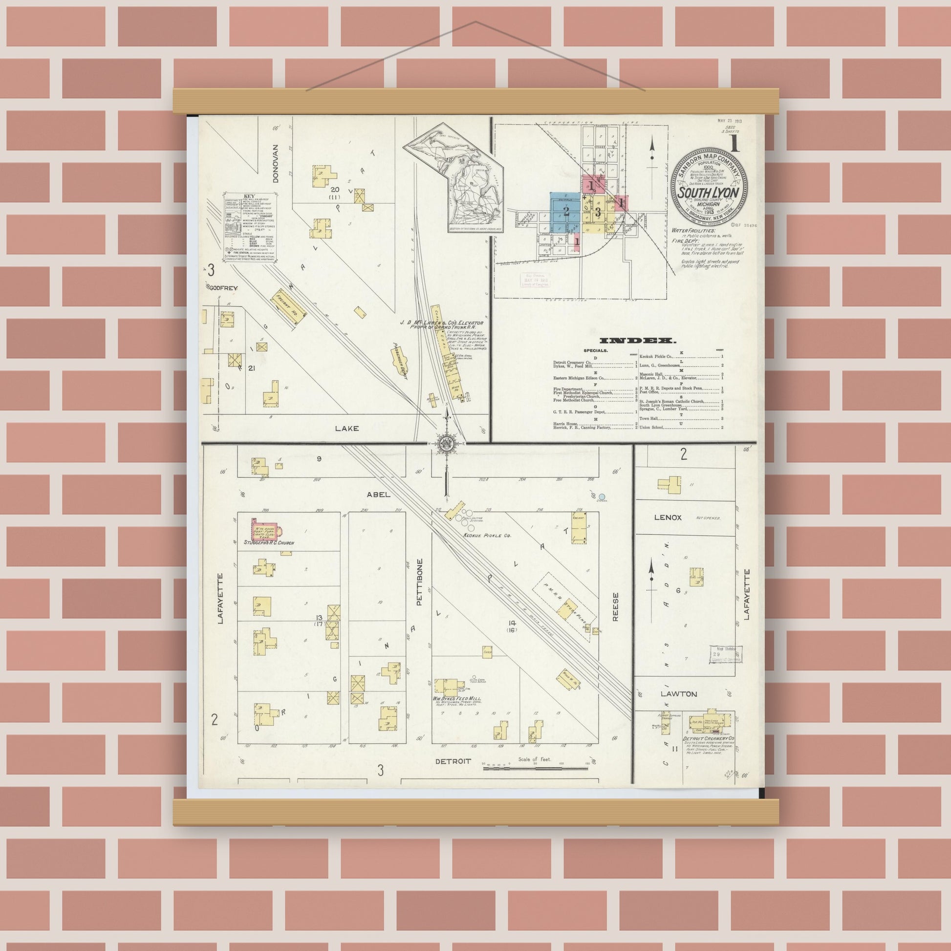 Old map wall art mockup — magnetic wood frame on brick wall — Sanborn Fire Insurance Map from South Lyon, Oakland County, Michigan (1913), Sheet #0001