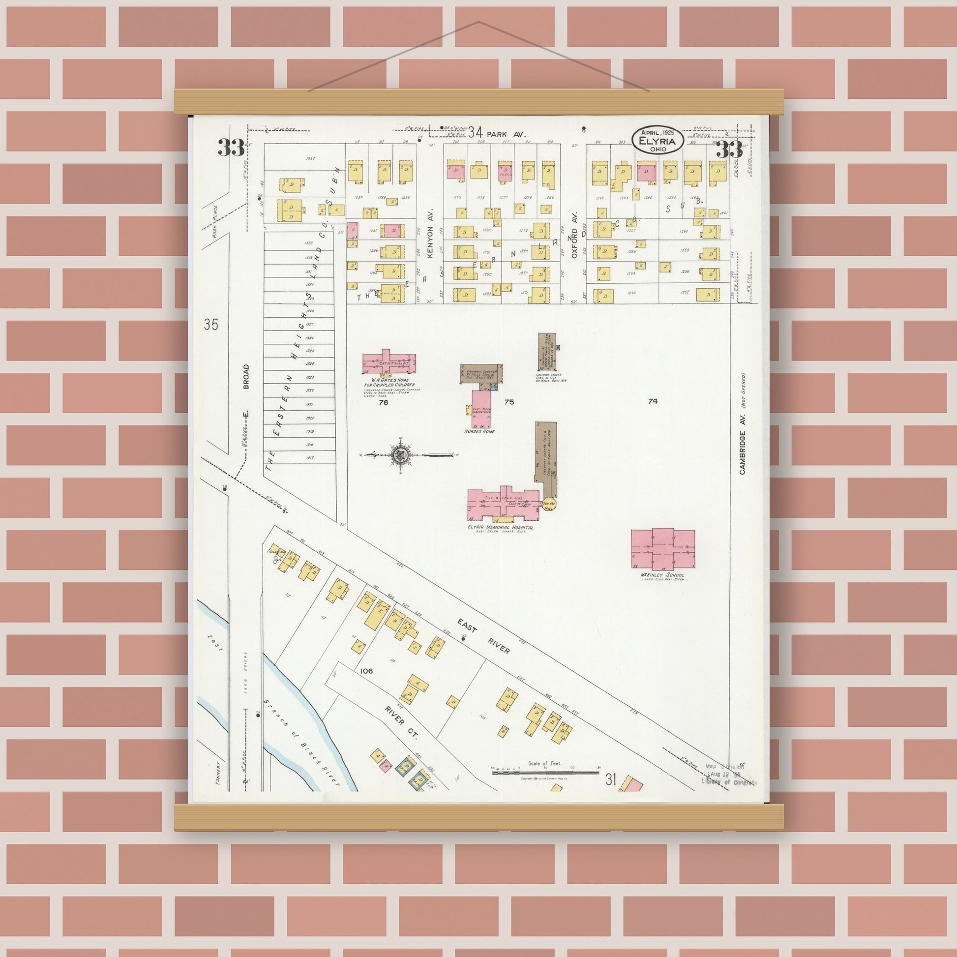 Old map wall art mockup — magnetic wood frame on brick wall — Sanborn Fire Insurance Map from Elyria, Lorain County, Ohio (1925), Sheet #0033
